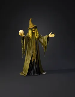 witch figure in tattered green robe holding glowing orb