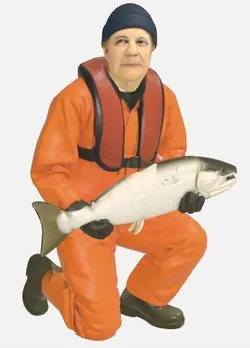 Fisherman kneeling with trout type 11