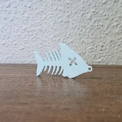 Fish scraper key ring
