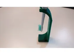 Electric toothbrush head holder