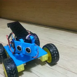 Create a robot car to avoid obstacles