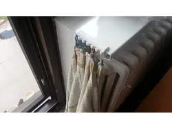 Hooks for dish towels on window ledge