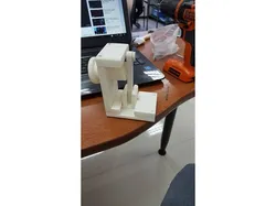 Rotary to linear motion converter mechanism