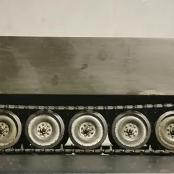 M113 T130E1 tracks w/ sprocket, final drive, idler arm assembly, and idler wheel