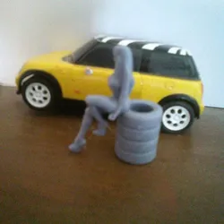 Woman leaning on tire 2 at 1/32