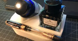Pen and inkwell holder