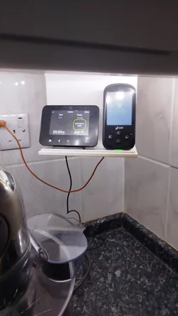 Under kitchen cupboard smart meter shelf