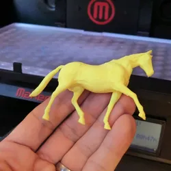 3D-printed toy horse figure (two halves)