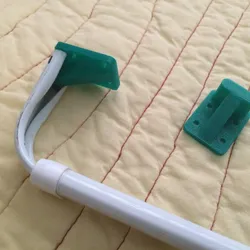 CURTAIN ROD HOLDER