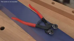 Ceramic Cutter With Red Handles On Frame 3D model