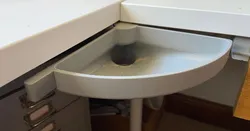 Corner desk dust sweepings collector