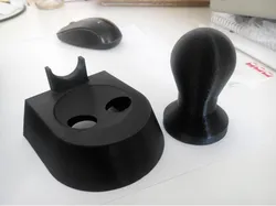 Delonghi tamper and tamper stand