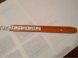 LED strip holder with landing pads