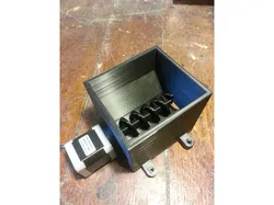 Auger-based feeder for animals, fish etc using Nema 17 stepper motor