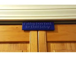 Folding door lock for child safety