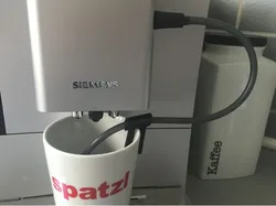 tube-holder coffee machine