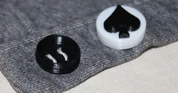 Exchangeable buttons with hiding place