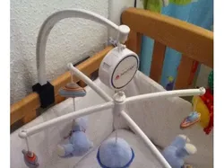 Cradle support for rotating toy