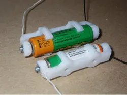 Battery holders for AA and AAA types