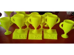 1st, 2nd, and 3rd place trophies with Fleur de Lis