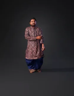 man wearing traditional kurta and blue dhoti