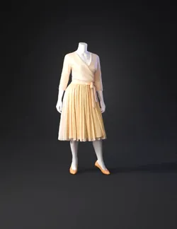 wrap dress with tulle skirt on mannequin in soft peach and pale yellow