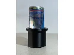 Adapter to put Red Bull can in a car cup holder