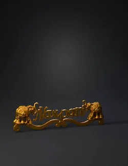 gold nameplate pendant with ornate elephant motifs and script letterin