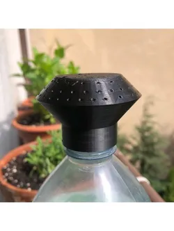 Sprinkler head for Volvic water bottle