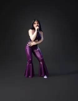 woman singer wearing sparkly purple outfit performing on stage